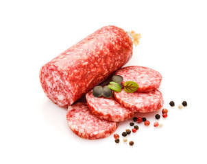 Salami smoked sausage, herb  and peppercorns isolated on white background cutout.