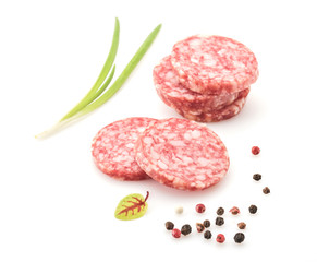 Salami smoked sausage, herb  and peppercorns isolated on white background cutout.