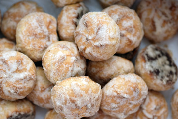 Round sweet gingerbread cookies with white sugar icing top view. Delicious soft wheat gingerbread for tea.