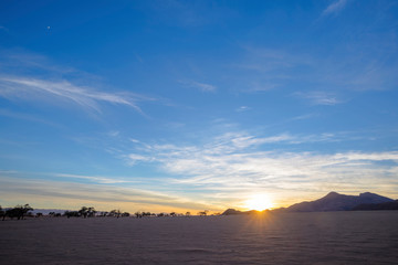 Sunrise at dry barren desert