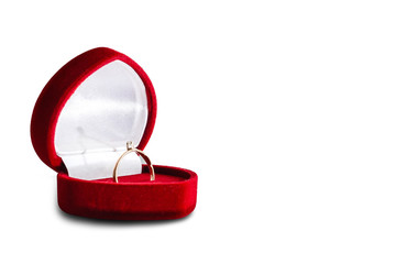 wedding rings in a gift box on white background