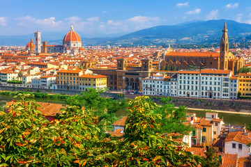Fototapeta na wymiar Beautiful view on Florence on bright summer day. Cathedral of Santa Maria del Fiore in Italy. Duomo of Florence