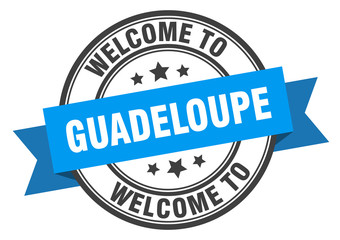 Guadeloupe stamp. welcome to Guadeloupe blue sign