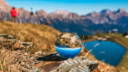 Crystal ball alpine landscape shot at Leogang, Salzburg, Austria