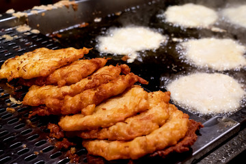 Fresh potato fritters. A popular traditional food at all markets and at home