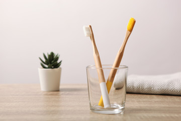 natural bamboo toothbrushes on the table. Oral and dental care.