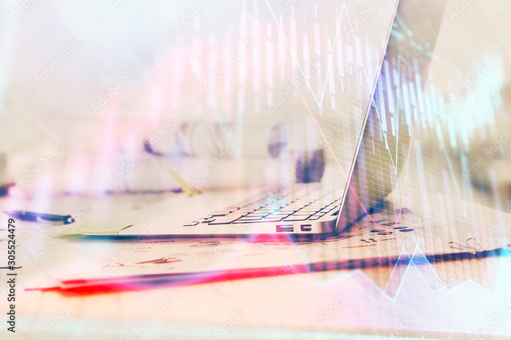 Poster forex graph hologram on table with computer background. multi exposure. concept of financial markets