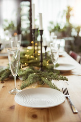 Christmas, holidays and eating concept - table served for festive dinner at home