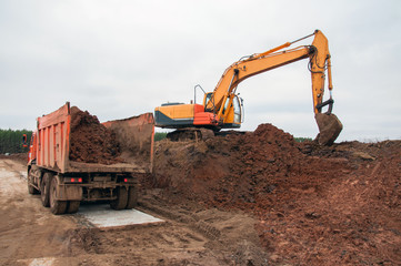Fototapeta na wymiar Special machinery Large construction excavator at construction work.