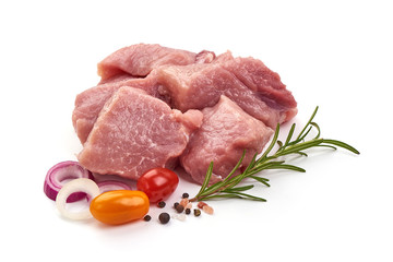 Raw pork pieces, isolated on white background