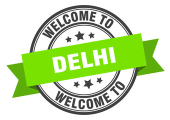 Delhi stamp. welcome to Delhi green sign