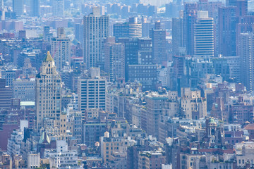 Compressed view of buildings and pollution nebula. Concept of crowded cities and pollution. NYC, USA