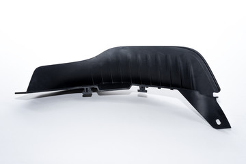 black mudguard for car made of thermoplastic elastomer on a white background - obrazy, fototapety, plakaty