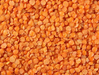 Red lentils background and texture 