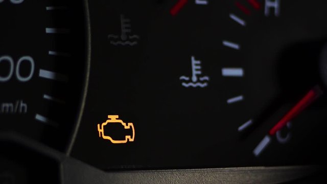 Check engine light symbol that pops up on dashboard when something goes wrong with the engine