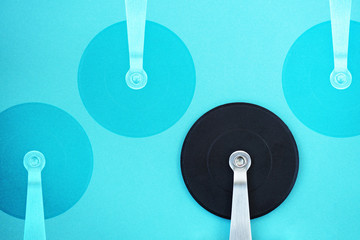Pizza cutter on blue background. Minimal Aesthetic.