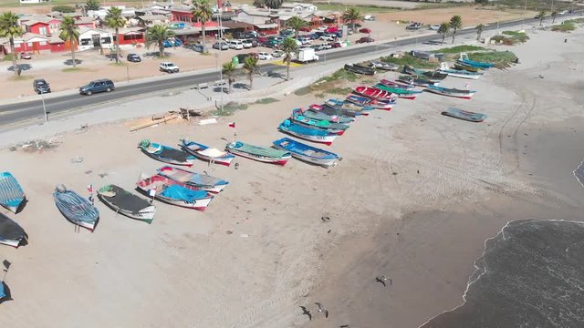 Colorful Boats on the shore beach, pacific ocean coast (Coquimbo, Chile)
