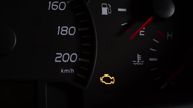 Check engine light symbol that pops up on dashboard when something goes wrong with the engine