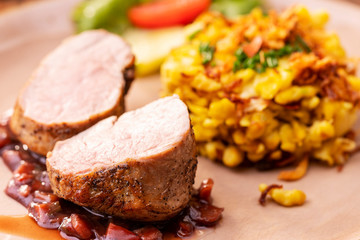 swabian pork fillet with spaetzle on wood