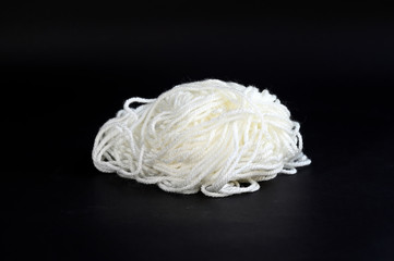 ball of white thread