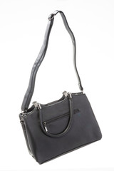 Naklejka premium women's leather black handbag on white background