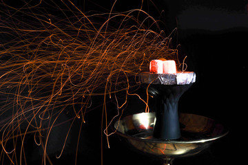 hookah with coal and sparks