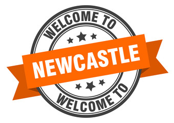 Newcastle stamp. welcome to Newcastle orange sign