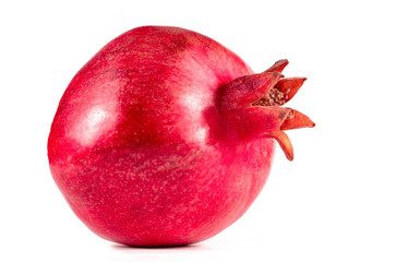 Red pomegranate on white background. Ripe tasty red pomegranate on white background