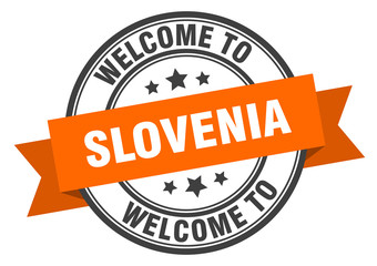 Slovenia stamp. welcome to Slovenia orange sign