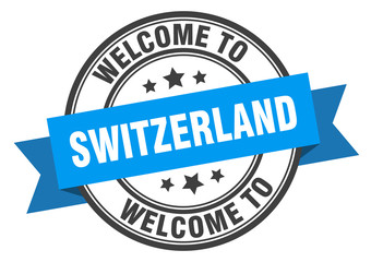 Obraz premium Switzerland stamp. welcome to Switzerland blue sign