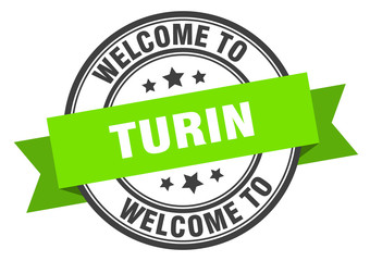 Turin stamp. welcome to Turin green sign