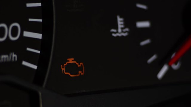 Check engine light symbol that pops up on dashboard when something goes wrong with the engine