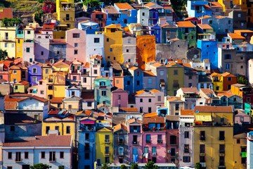 view of the facades of the houses of Bosa known for its characteristic colorful houses, Sardinia, Italy - 305541450