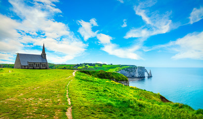 Etretat village, Church and Aval cliff. Normandy, France.