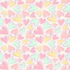 Seamless vector pattern with hearts in pastel colors.