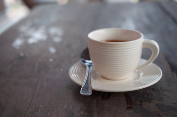 Coffee  on old wooden desk