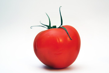 Red tomato isolated on white background. Clipping path . Fresh tomato. Tomato isolated on white background