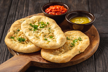 Homemade naan bread with garlic and butter.