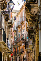 Fototapeta premium Baroque and ancient alley in the city of Syracuse in Sicily, Italy