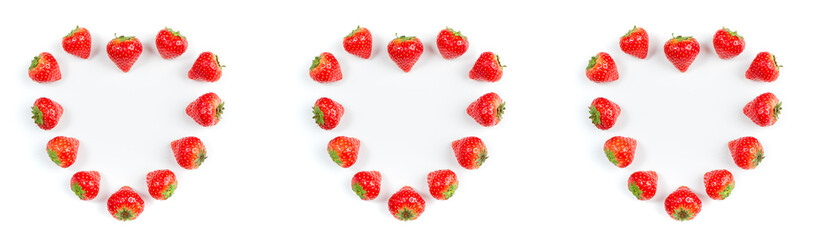 Strawberry on white background, top view. Berries pattern. Hearts frame made of fresh strawberry on white background. Valentine, romantic, creative food concept. Long format with copy space