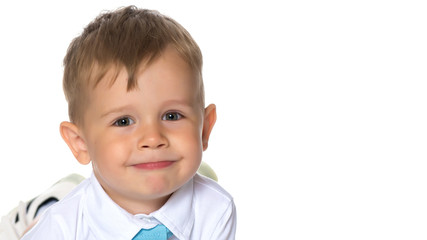 The little boy smiles. Portrait.Close-up.