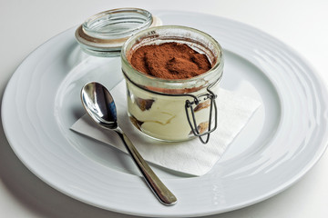 Portion of Tiramisu dessert in jar