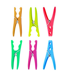 Bright colored plastic clothespins on a white background set