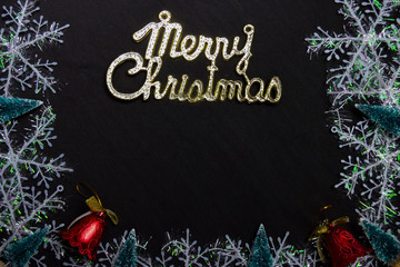 merry christmas text and Decorative Christmas isolated on black background