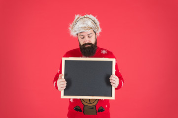 Additional services. Winter announcement. Bearded hipster man blank blackboard copy space. Santa Claus advertisement. Chalkboard information. Seasonal offer. Christmas offer. Special offer concept