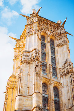 Medieval architecture in the form of a tower on a background of blue sky - Saint-Jacques Tower in Paris