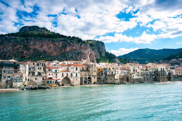 Fototapeta na wymiar Cefalu. Ligurian Sea and old town-medieval sicilian city