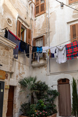 Fototapeta na wymiar Laundry drying in the charming seaside town of Polignano al Mare; Puglia; Italy