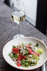 Roasted Pepper and Blue Cheese Salad with Pine Nuts and Raisins