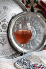 Iced Rosehip Drink. Light Metal Background.